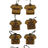 Small wooden stitch markers with engraved words