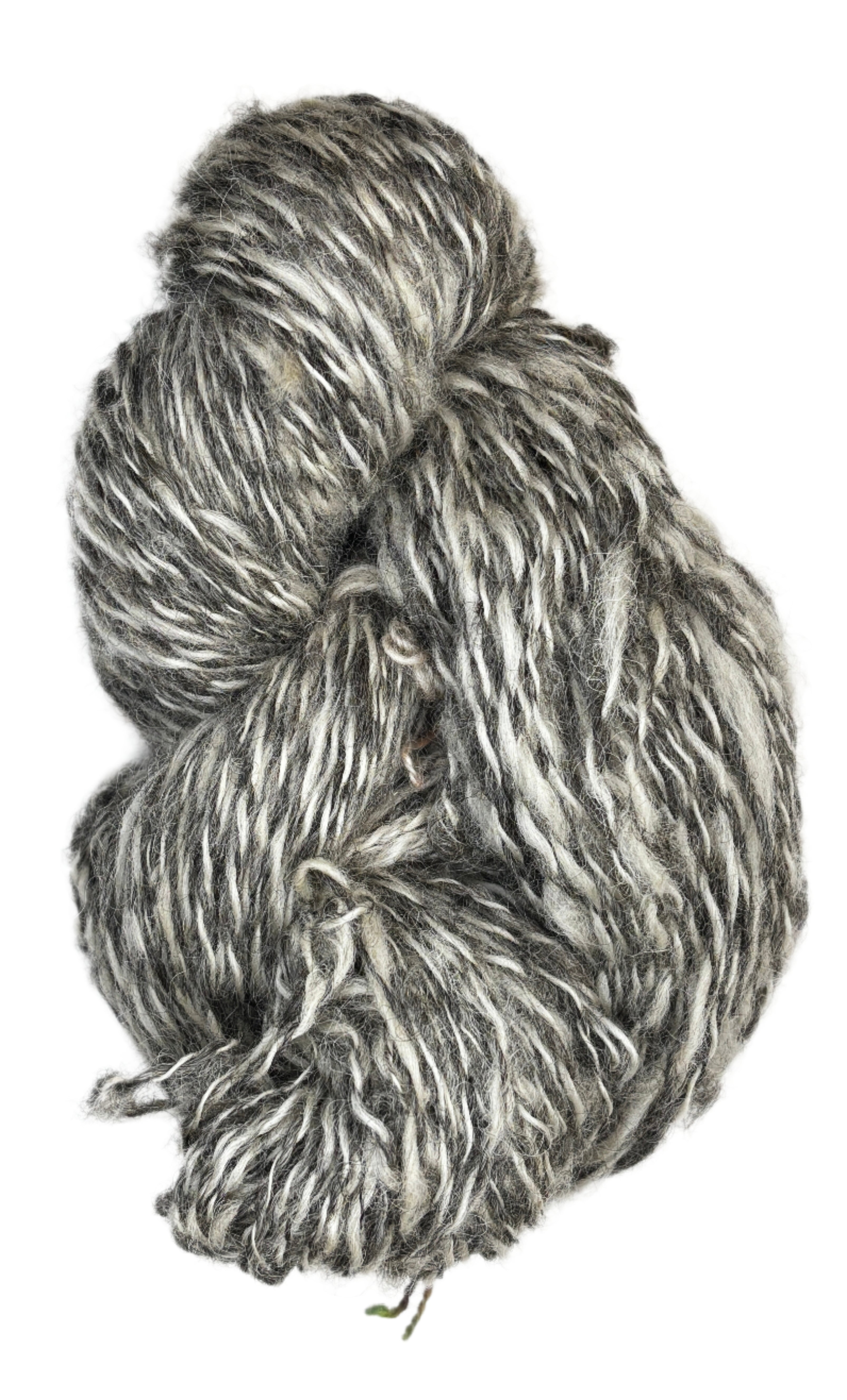 Skein of handspun yarn from Tronstad Ranch in Wyoming in the color natural grey and white