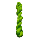 Braided green yarn on a white background