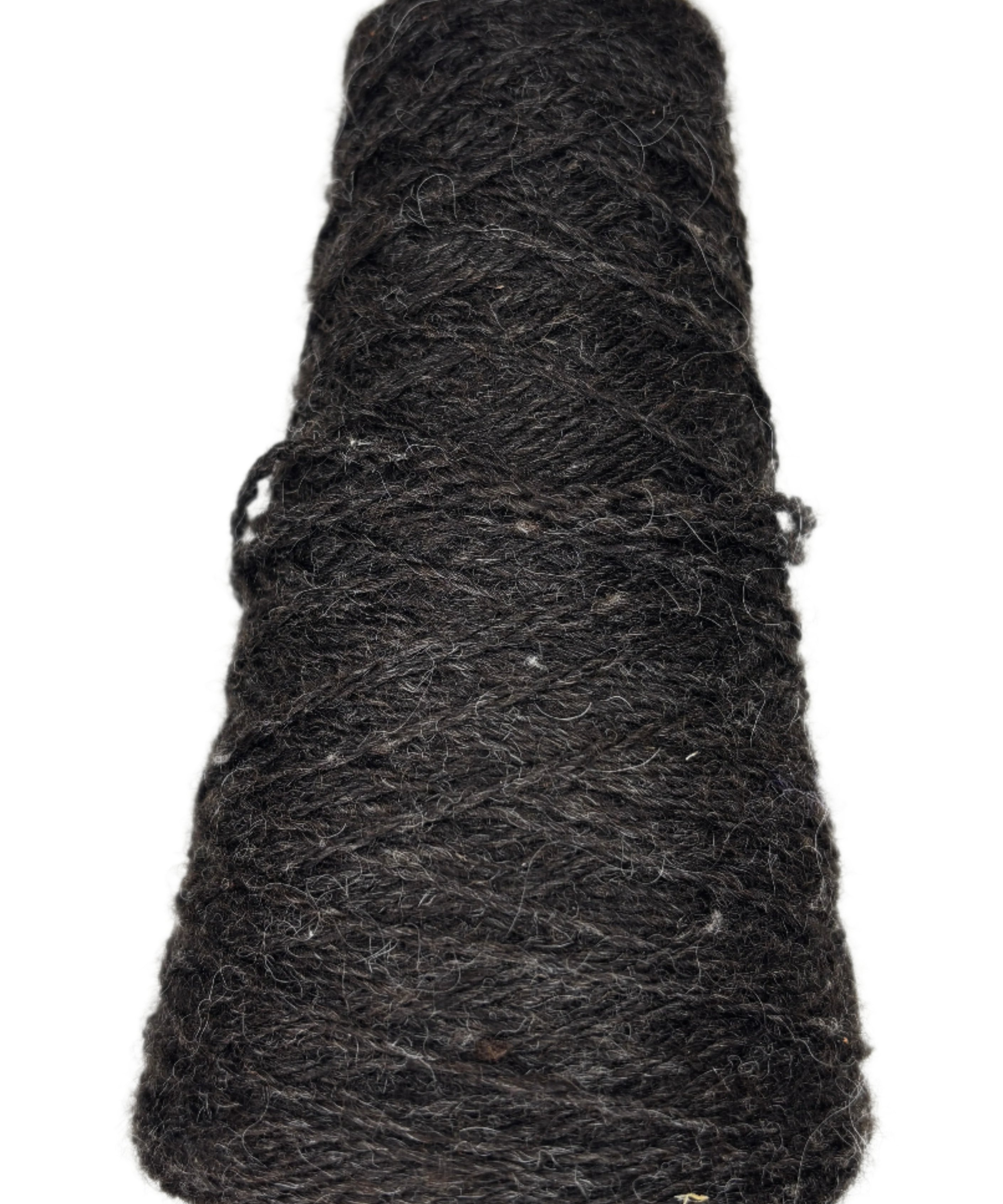 A cone of handspun worsted weight wool in the color natural brown