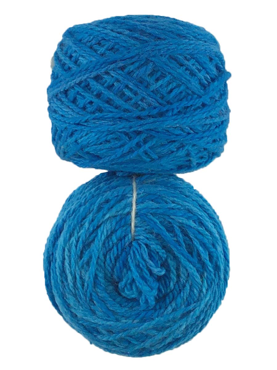 Photo of two balls of blue Tronstad yarn