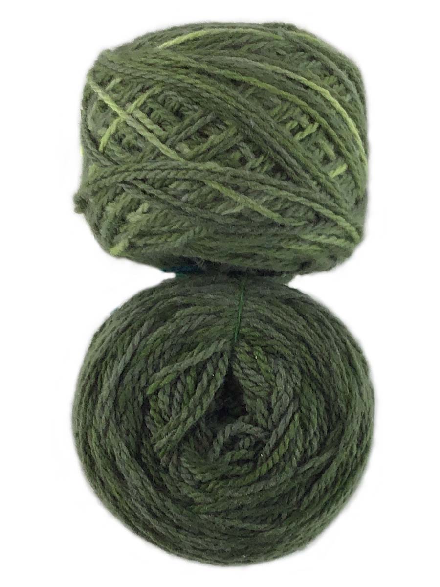 Photo of two balls of green Tronstad yarn