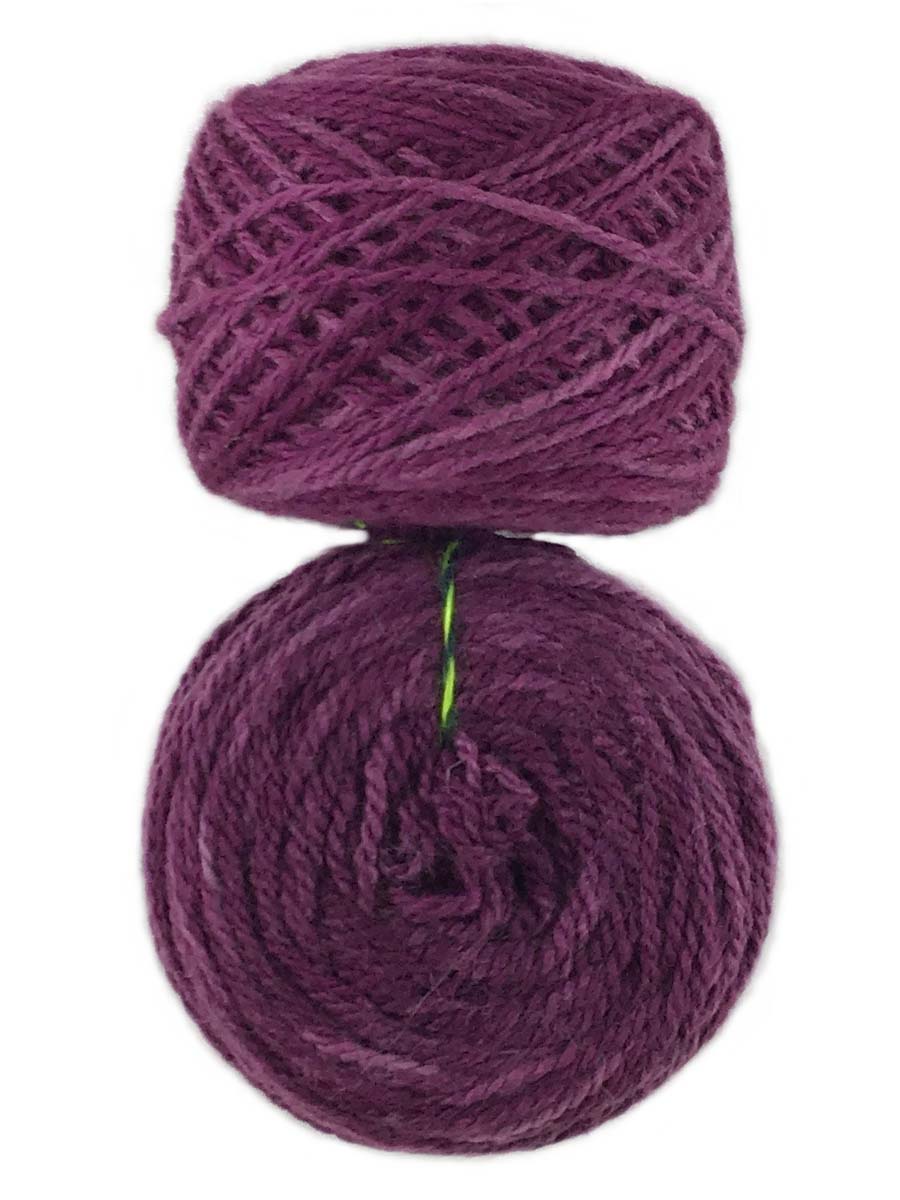 Photo of two balls of purple Tronstad yarn