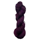 Maroon Skein of yarn on a white background