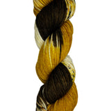 BROWN AND GOLD SKEIN OF WORSTED WEIGHT YARN 