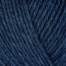 Detailed view of a skein of superwash wool yarn, showcasing a navy blue hue.