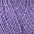 Detailed view of a skein of superwash wool yarn, showcasing a purple hue.