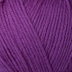 Detailed view of a skein of superwash wool yarn, showcasing a purple hue.