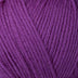 Detailed view of a skein of superwash wool yarn, showcasing a purple hue.