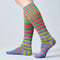 Colorful striped socks on a plain background