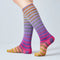 Colorful striped socks on a plain background