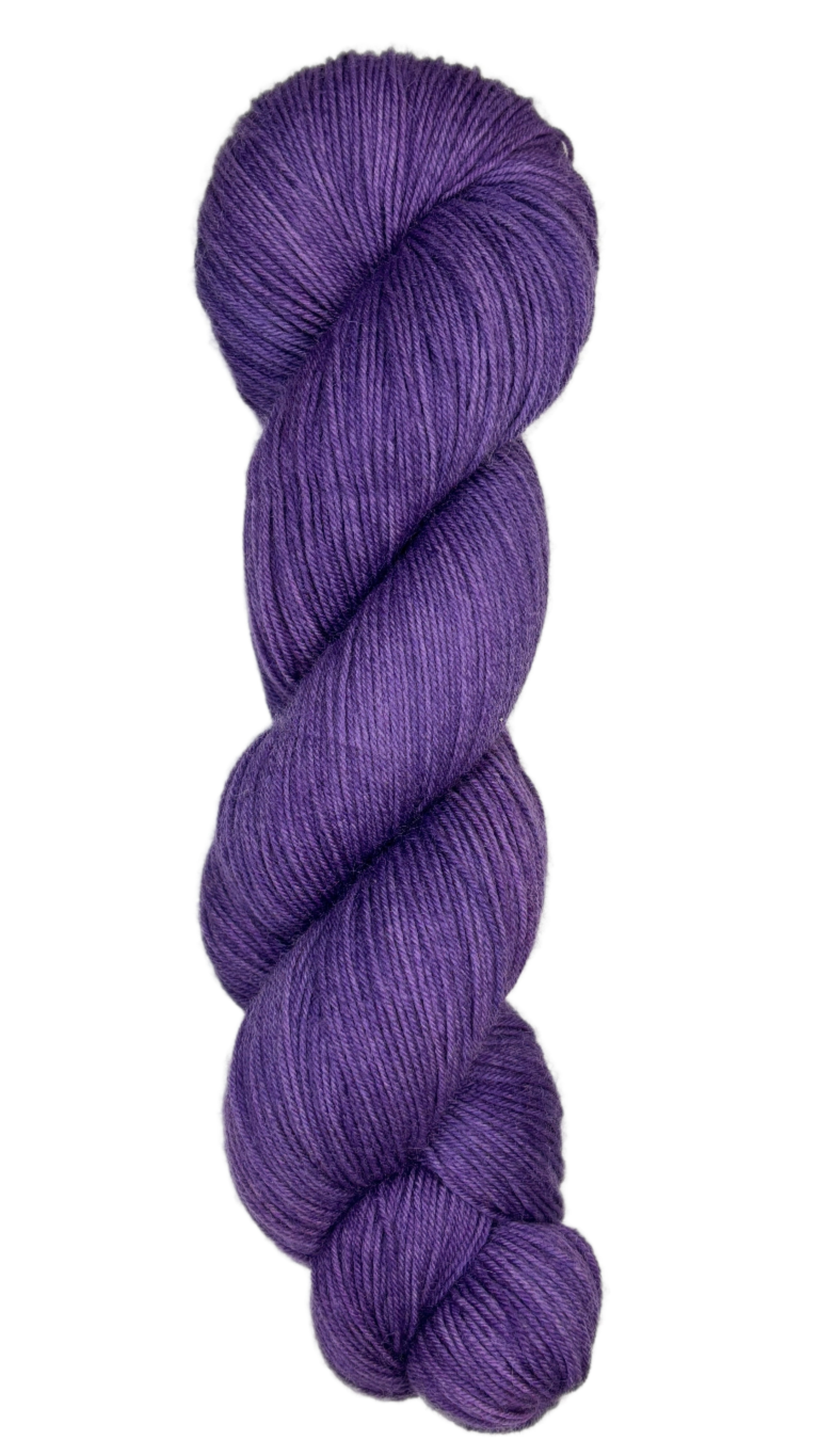 Skein of hand dyed fingering weight yarn in the color violet