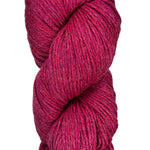 A skein of wool yarn in the color magenta