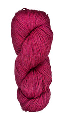 A skein of wool yarn in the color magenta