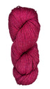 A skein of wool yarn in the color magenta