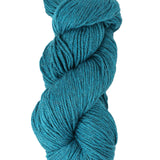 A skein of Berroco Vintage Worsted yarn color teal