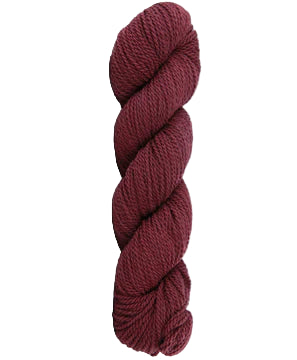 Burgundy skein of mountain meadow wool yarn on a white background