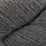 A close-up of dark gray plied yarn with a soft, heathered texture.