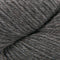 A close-up of dark gray plied yarn with a soft, heathered texture.