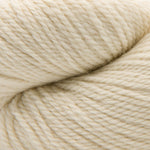 A close-up of cream-colored yarn with a soft, twisted texture filling the frame.
