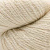 A close-up of cream-colored yarn with a soft, twisted texture filling the frame.