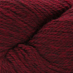 A close-up of dark red yarn with a soft, fuzzy texture, filling the entire frame.