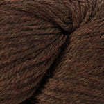 A close-up of dark brown yarn with subtle red and beige variegated threads, showing the fuzzy texture of the fibers.