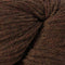 A close-up of dark brown yarn with subtle red and beige variegated threads, showing the fuzzy texture of the fibers.