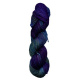 Braided skein of blue and purple yarn on a white background
