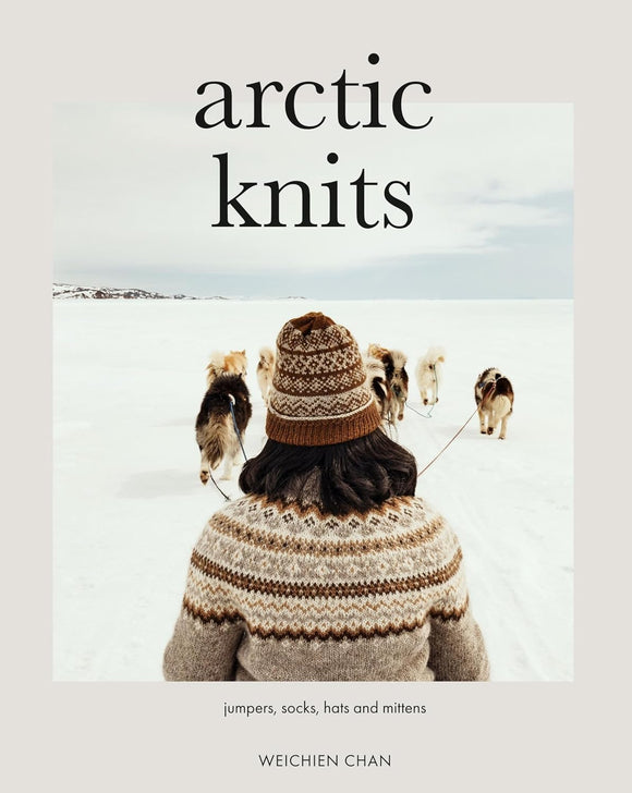 Book cover of 'Arctic Knits' featuring a person in knitted clothing with dogs in a snowy landscape.