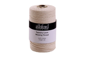 Cone of off-white warping thread