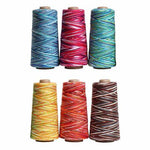 Cones of multi-colored cotton yarn 