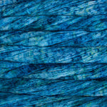 Close-up of blue yarn with a textured pattern