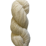 A single skein of cream-colored yarn with a soft, natural texture, photographed on a clean white background.