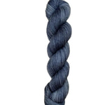 Skein of superkid mohair silk lace weight yarn color black grey