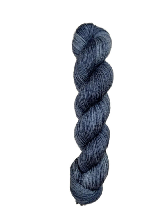 Skein of superkid mohair silk lace weight yarn color black grey