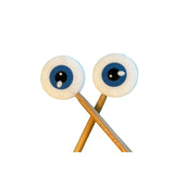 Eyeball-shaped stitch stoppers on crossed needled