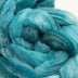 a braid of ready to be spun fiber color blue