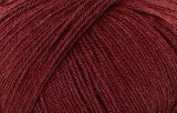 Detailed image of Fonty Moustache Fingering Weight Yarn in the color brick red