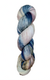 A skein of hand-dyed fingering/sock yarn color pink white blue brown speckles