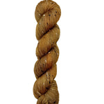 Skein of hand dyed BFL Tweed Yarn color golden brown