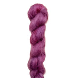 Skein of superkid mohair silk lace weight yarn color red 