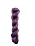 Skein of superkid mohair silk lace weight yarn color purple black