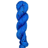 Skein of hand dyed BFL Tweed Yarn color blue