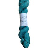 Skein of hand dyed BFL Tweed Yarn color spruce green