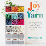 Book cover of 'The Joy of Yarn' by Marie Greene with yarn colors and storage boxes on a white background.