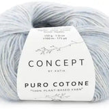 Ball of light icy blue yarn with 'Concept by Katia' label on a white background