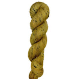 Skein of hand dyed BFL Tweed Yarn color golden yellow