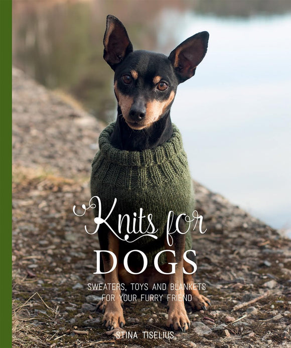 Dog wearing a green knitted sweater with 'Knits for Dogs' text on a natural background