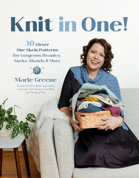 Book cover of 'Knit in One!' featuring a woman holding a basket of knitted items.